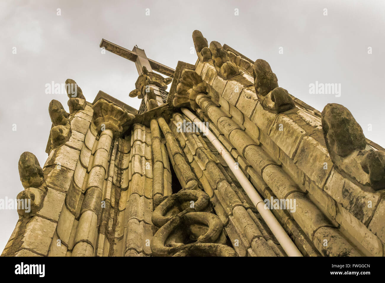 Low angle detail view of neo gothic style San Juan Basilica at historic center of Quito, Ecuador Stock Photo