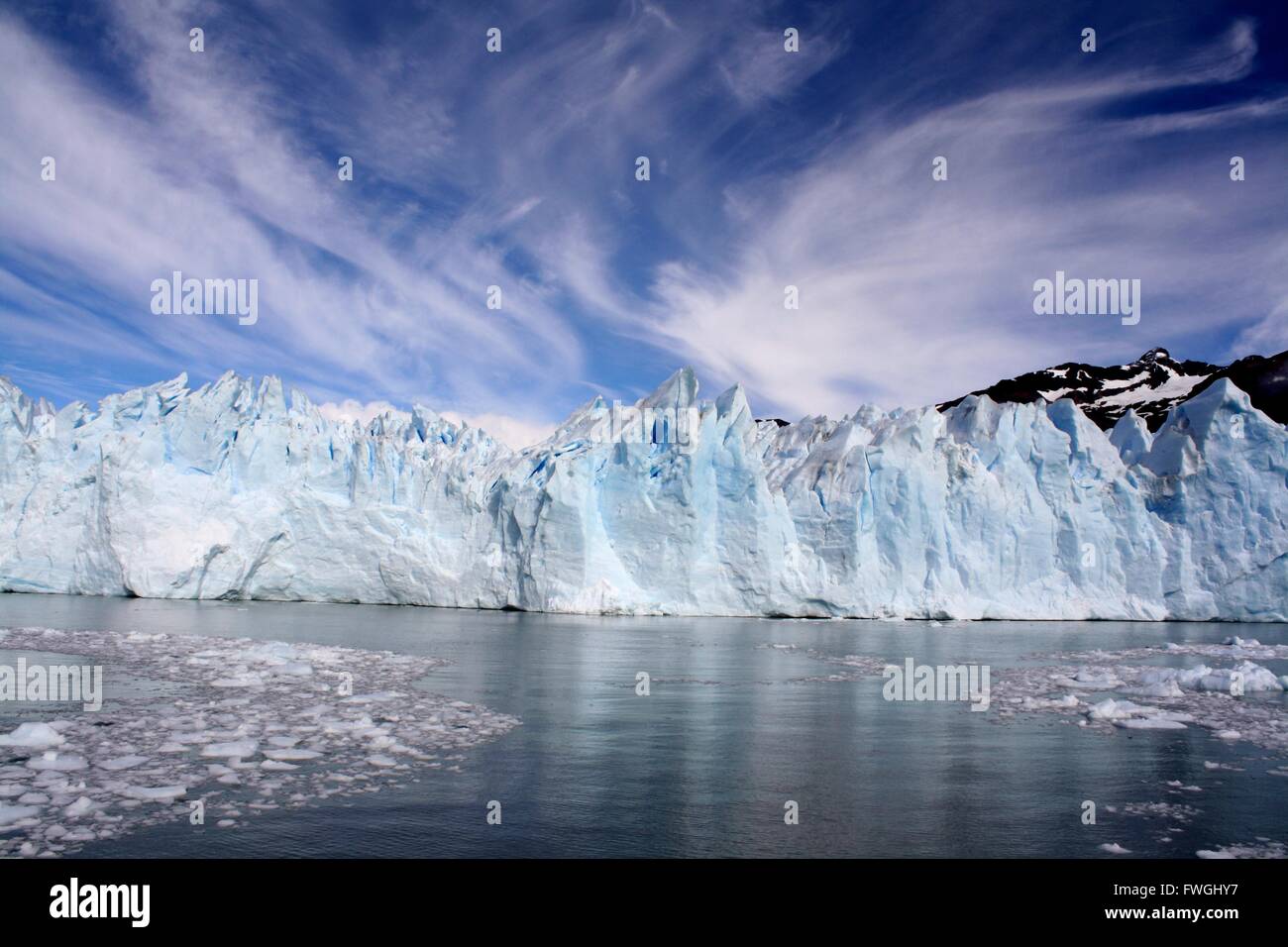 Spectacular Ice Fall reflected on the surface of the sea Stock Photo