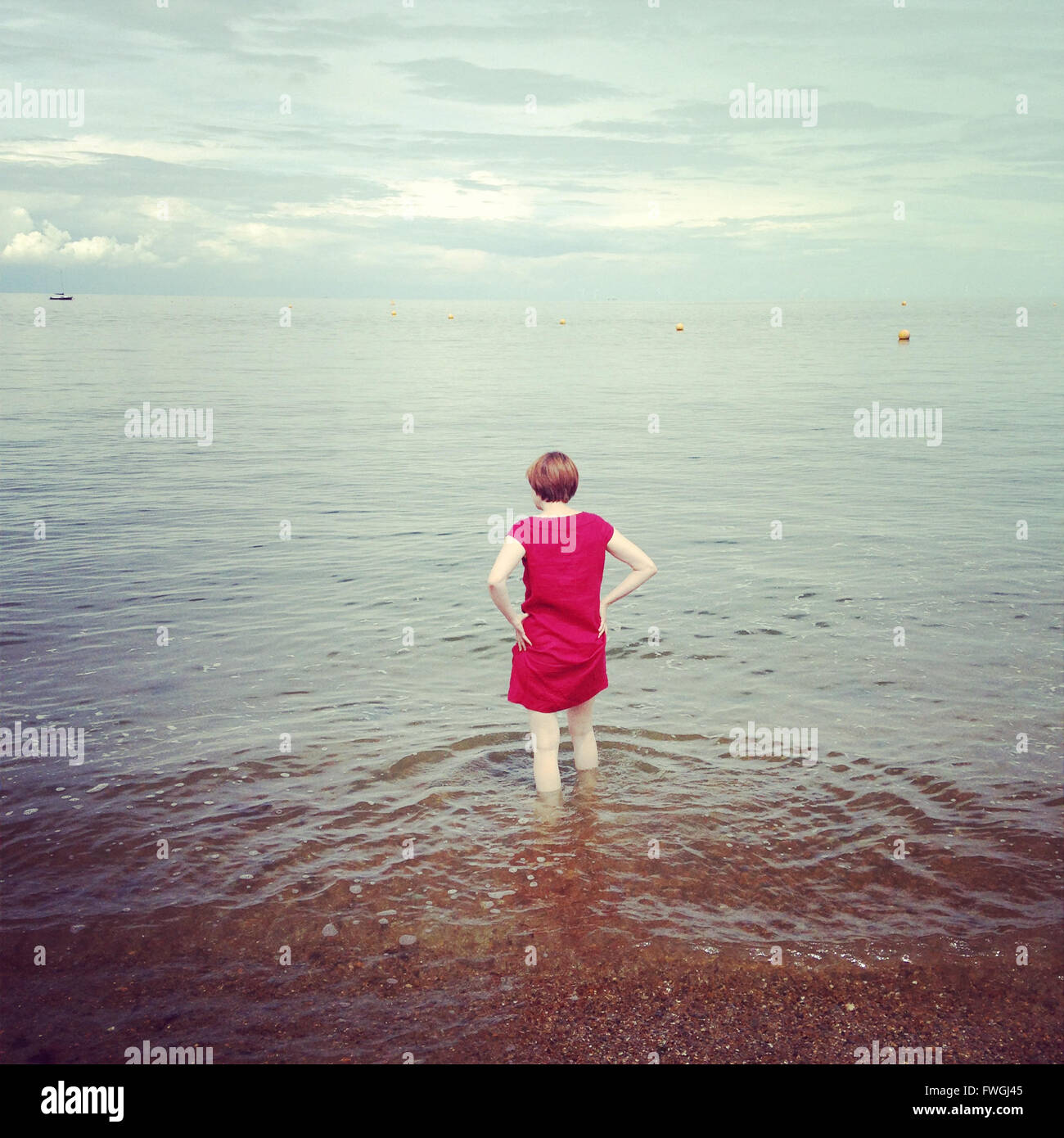 Woman wading in water hires stock photography and images Alamy