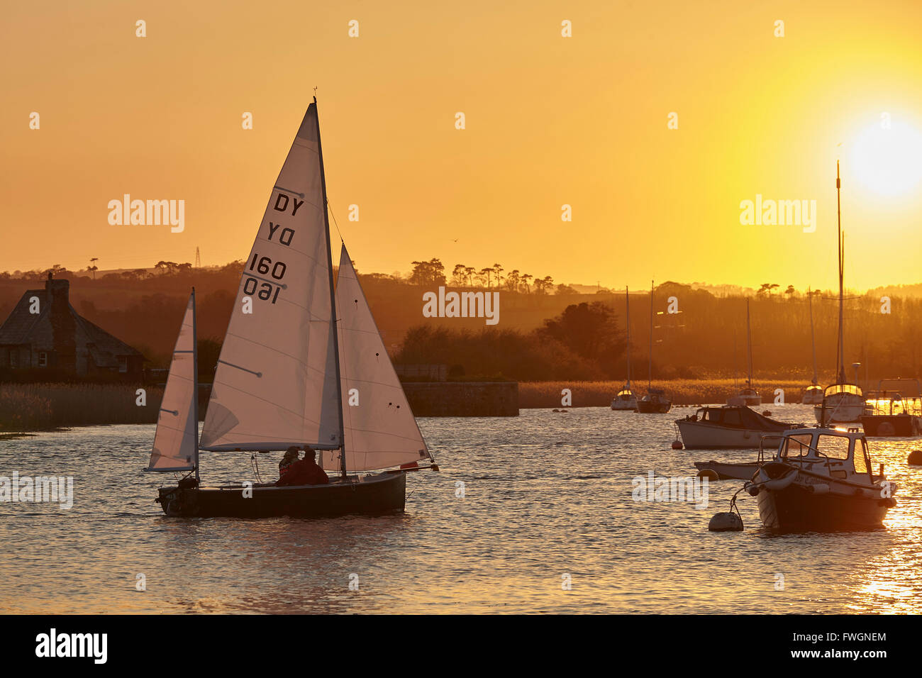 A sunset view of sailing on the River Exe at Topsham, near Exeter, Devon, England, United Kingdom, Europe Stock Photo