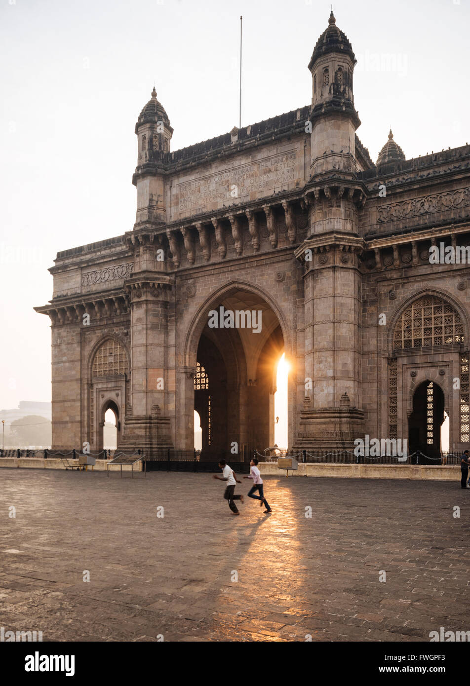 Sunrise behind The Gateway to India, Mumbai (Bombay), India, South Asia Stock Photo