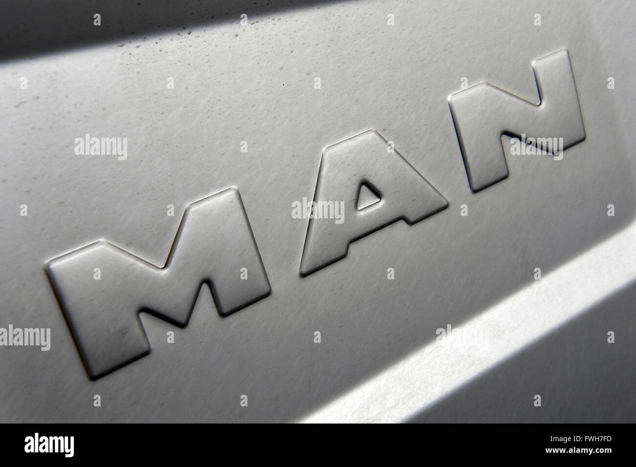 Munich, Germany. 04th Apr, 2016. A corporate logo of lorry manufacturer MAN, in Munich, Germany, 04 April 2016. Photo: PETER KNEFFEL/dpa/Alamy Live News Stock Photo