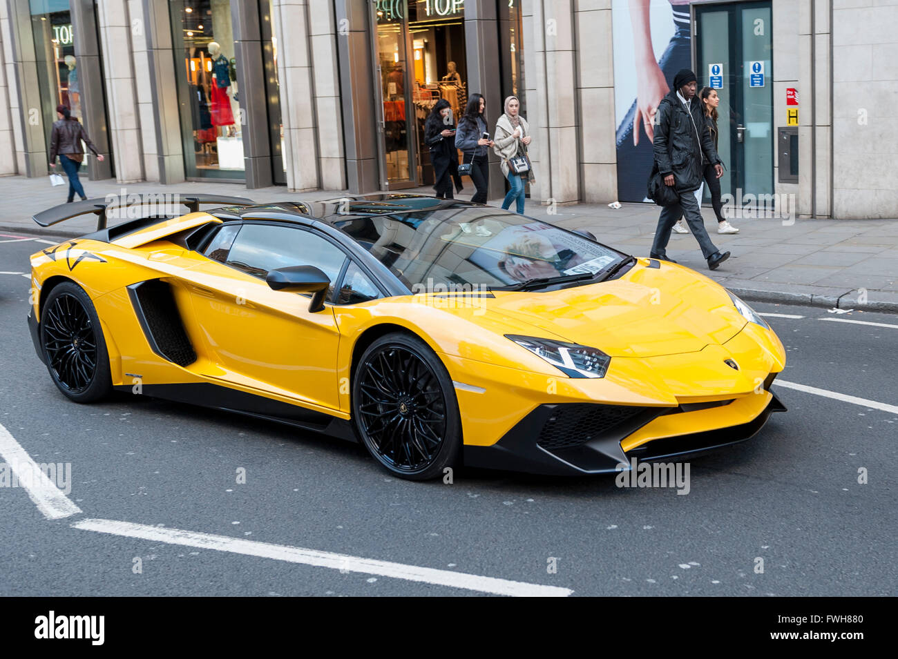London, UK. 5 April 2016. A bright yellow Lamborghini ...