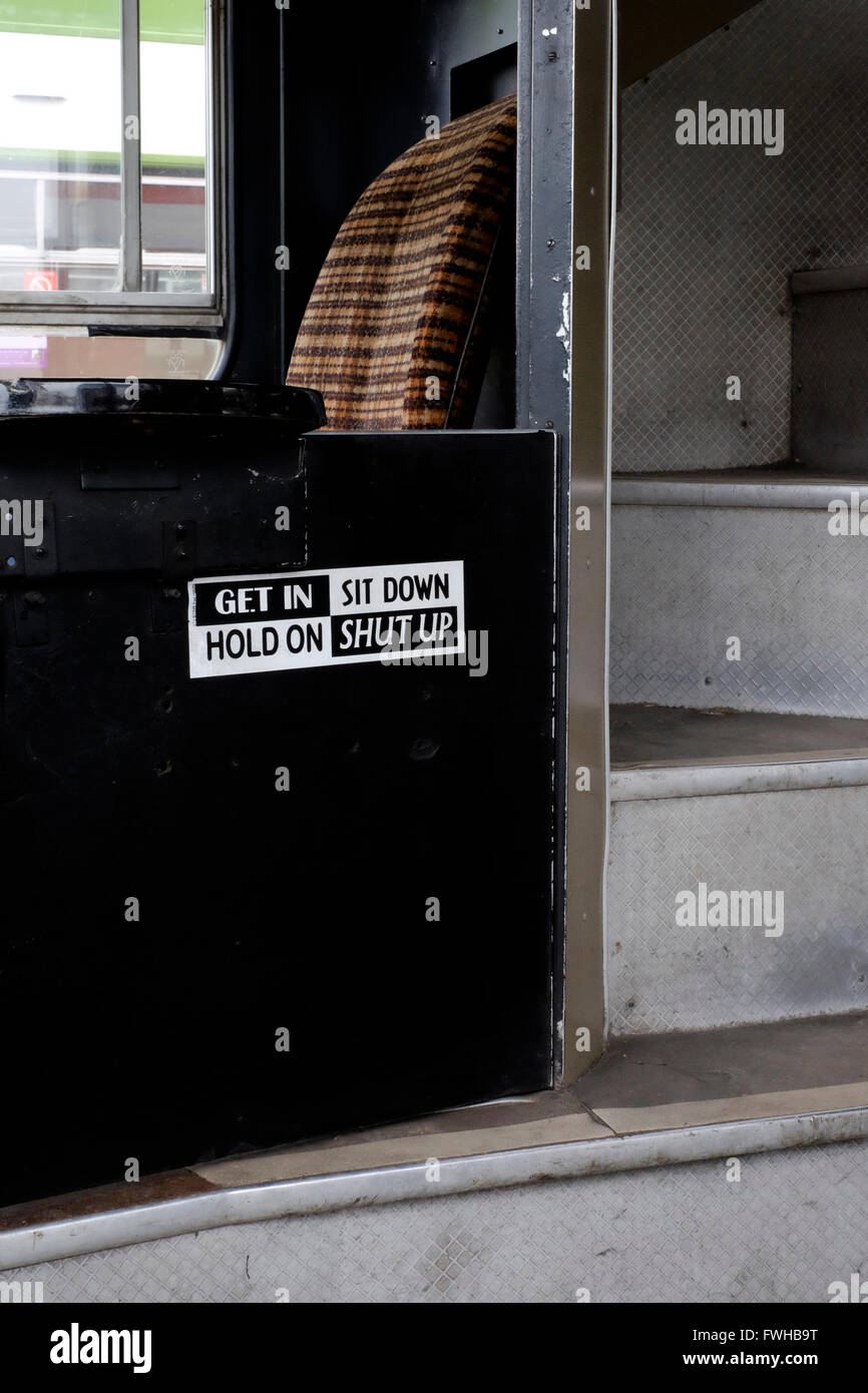 amusing sign and stairs on a bus at a show of classic vintage buses ...