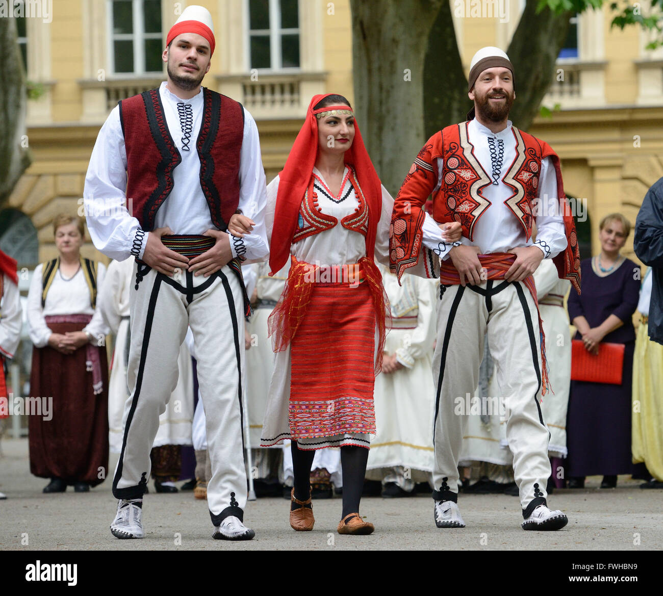 Zagreb, Croatia. 12th June, 2016. Participants dressed in Albanian folk costumes perform during the annual Day of National Minorities at Zrinjevac Park in Zagreb, Croatia, June 12, 2016. Members of 18 national minorities settled in Croatia presented their traditional customs, food and folklore to tourists and locals on Sunday. Credit:  Miso Lisanin/Xinhua/Alamy Live News Stock Photo