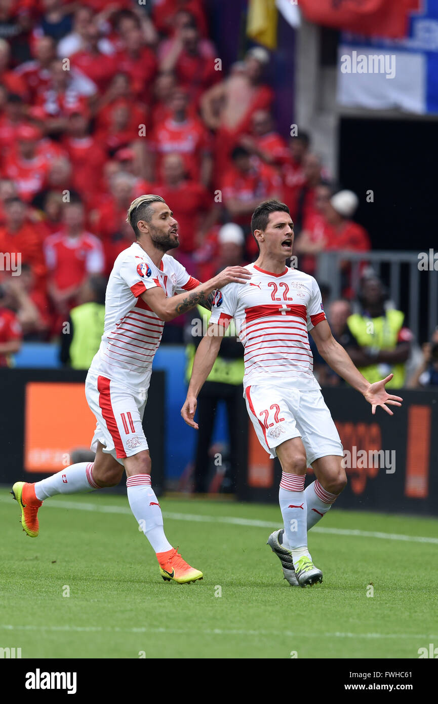 Lens, France. 11th June, 2016. (L-R) Valon Behrami, Fabian Schar (SUI) Football/Soccer : Fabian Schar of Switzerland celebrates after scoring their 1st goal during the UEFA EURO 2016 Group A match between Albania 0-1 Switzerland at Stade Bollaert-Delelis in Lens, France . © aicfoto/AFLO/Alamy Live News Stock Photo