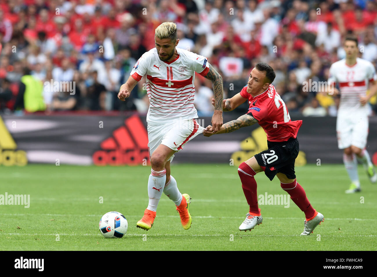 Lens, France. 11th June, 2016. Valon Behrami (SUI), Ergas Kace (ALB) Football/Soccer : UEFA EURO 2016 Group A match between Albania 0-1 Switzerland at Stade Bollaert-Delelis in Lens, France . © aicfoto/AFLO/Alamy Live News Stock Photo