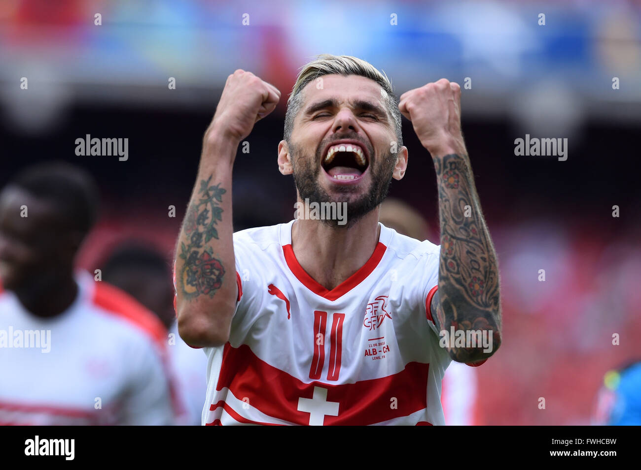 Lens, France. 11th June, 2016. Valon Behrami (SUI) Football/Soccer : Valon Behrami of Switzerland celebrates after winning the UEFA EURO 2016 Group A match between Albania 0-1 Switzerland at Stade Bollaert-Delelis in Lens, France . © aicfoto/AFLO/Alamy Live News Stock Photo