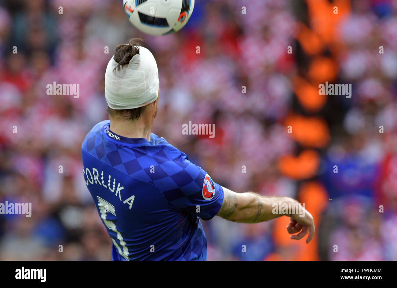 Vedran Corluka of Croatia plays with his head bandaged during the UEFA Euro 2016 Group D soccer match between Turkey and Croatia in the Parc de Princes stadium in Paris, June 12, 2016. Photo: Peter Kneffel/dpa Stock Photo