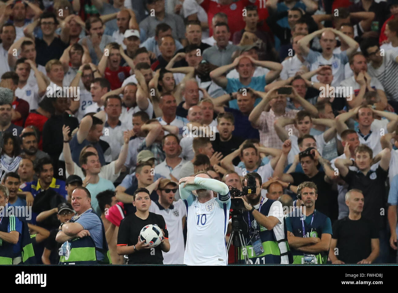 11.06.2016. Marseille, France. European Football Championships 2016. England versus Russia.  Wayne Rooney (ENG) covers his face as do some fans Stock Photo