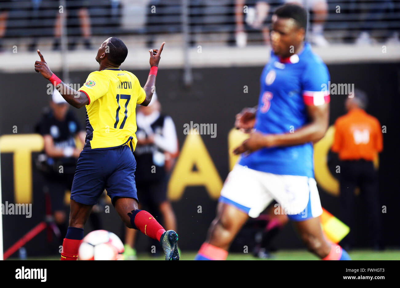 New Jersey, USA. 12th June, 2016. Jaime Ayovi (L) of Ecuador celebrates after scoring during the Copa America Centenario football tournament match against Haiti in East Rutherford, New Jersey, United States, on June 12, 2016. Ecuador won 4-0. Credit:  Qin Lang/Xinhua/Alamy Live News Stock Photo
