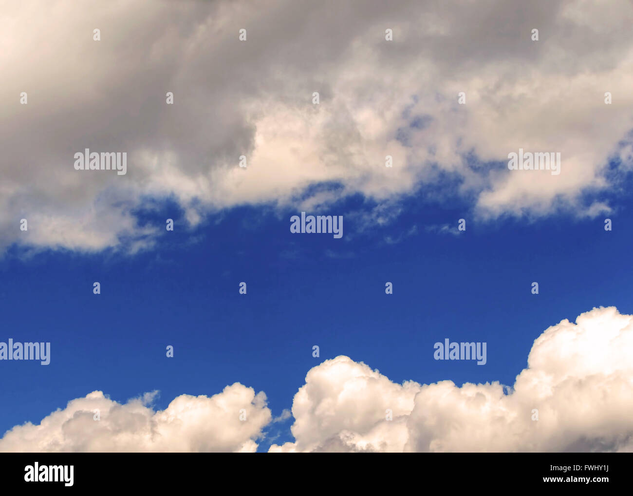 Summer Background Of Blue Sky And Fluffy White Clouds Stock Photo - Alamy