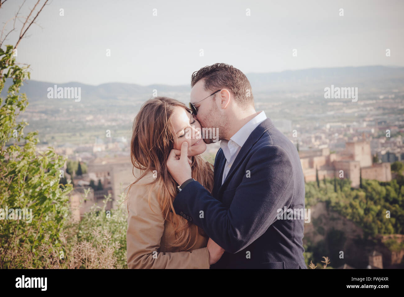 Woman man kissing outdoors hi-res stock photography and images - Alamy