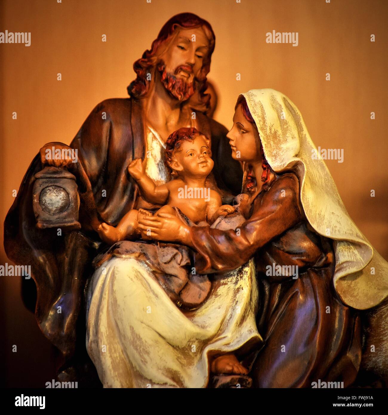 Holy Family Sculpture Against Wall Stock Photo Alamy