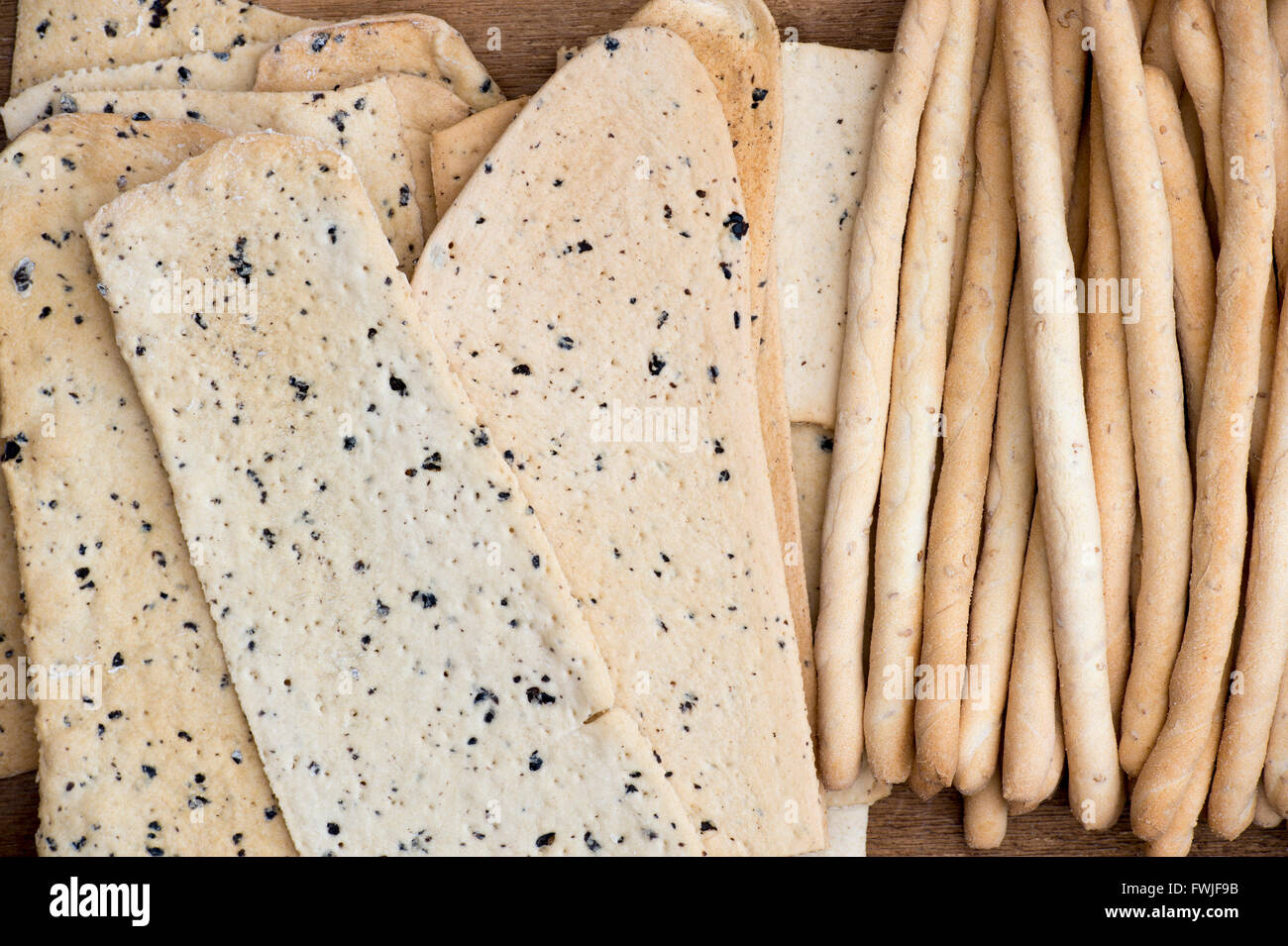 Italian Crispy flatbread / Croccante and Sesame rubato breadsticks Stock Photo
