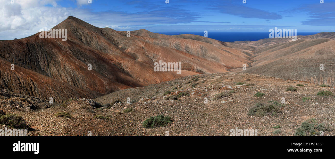 View from the top of the Degollada del Viento pass on the Morro Colorado, Fuerteventura, Canary Islands, Spain Stock Photo