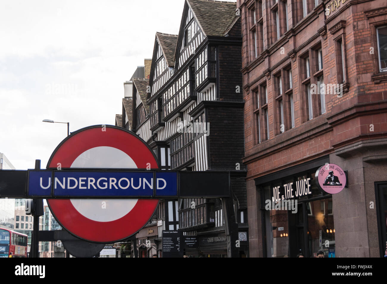 Underground roundel and Chancery Lane tube station with Staple Inn Buildings in High Holborn, City of London, UK. Stock Photo