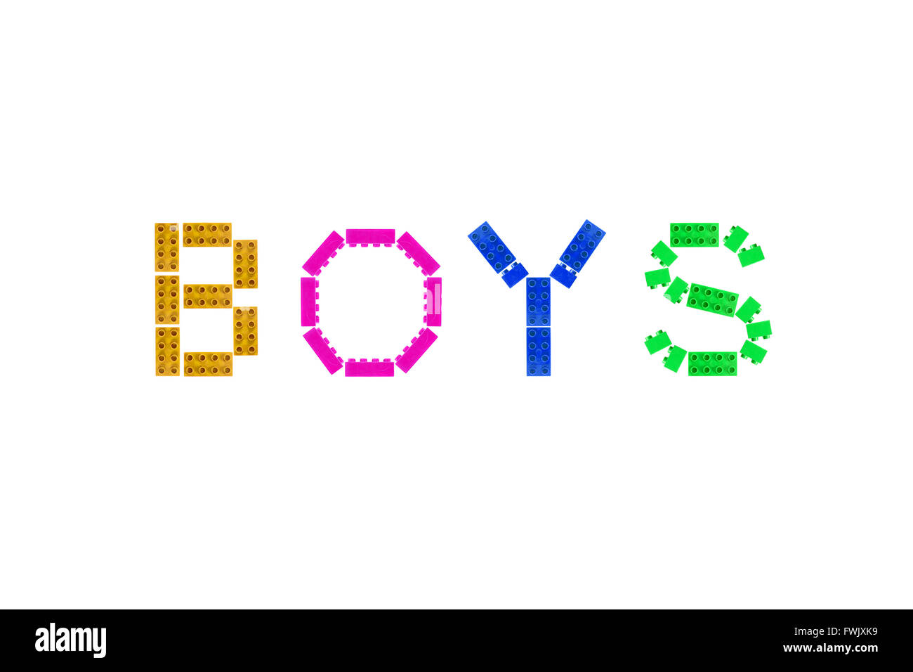 The word Boys created from pieces of Lego photographed against a black background. Stock Photo