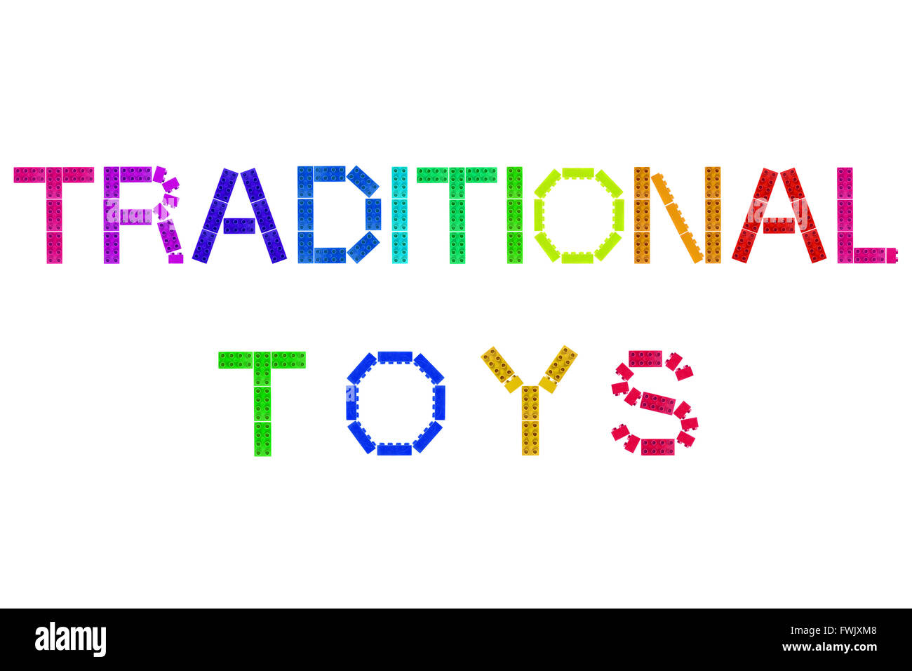The words Traditional Toys created form Lego and photographed against a white background. Stock Photo