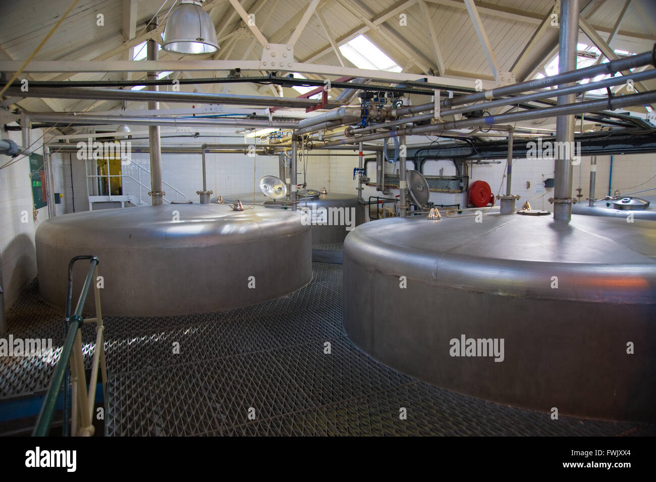Metal washback fermentation tanks at a distillery Stock Photo Alamy