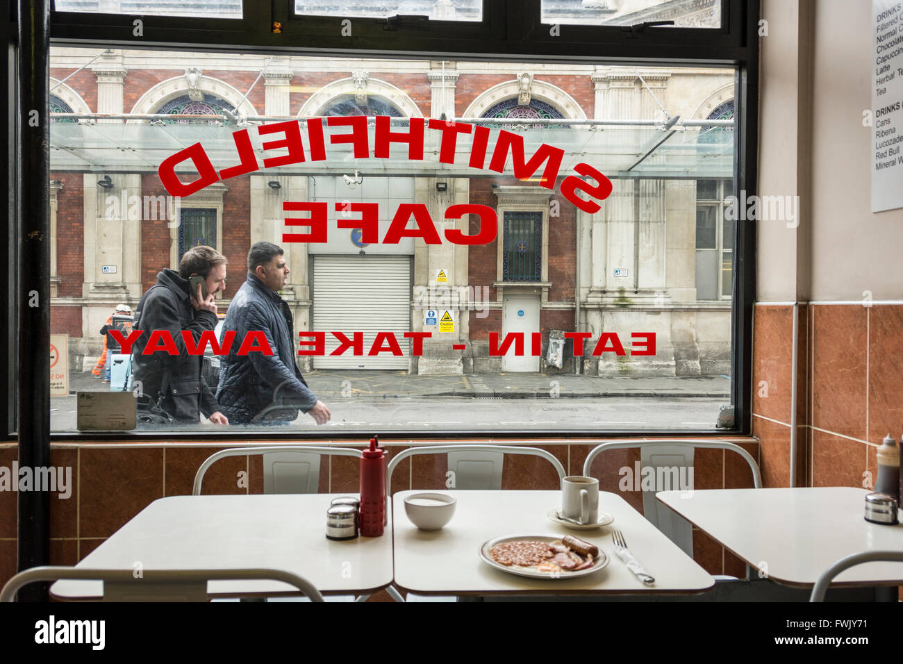 Full English breakfast at the Smithfield Cafe in Smithfield central London, England, UK Stock Photo