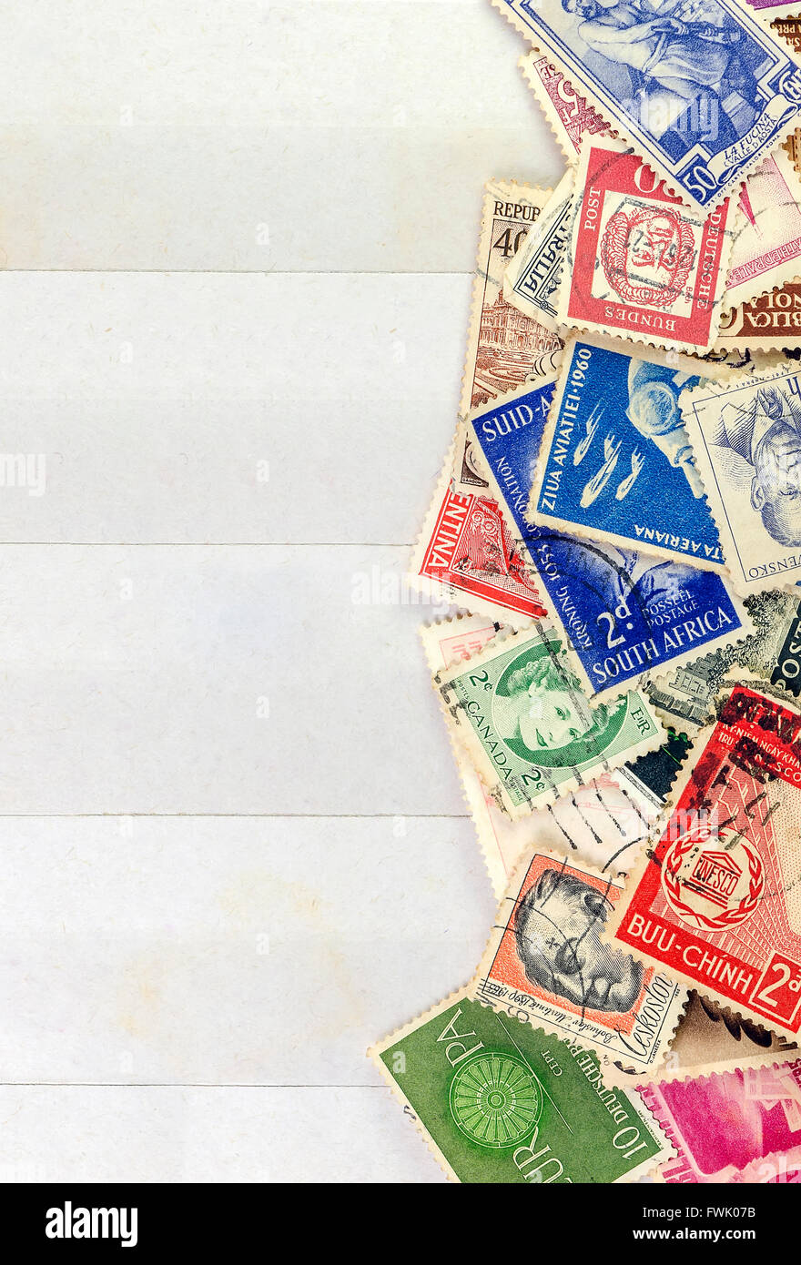 Used stamps mail of different countries on the book collecting stamps