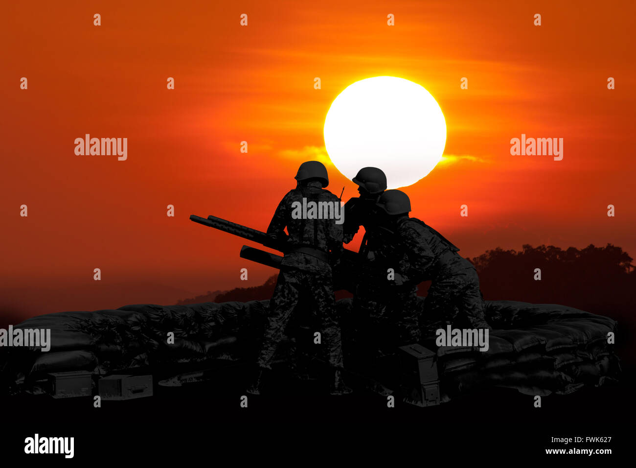 Anti Aircraft fire machine gun and three soldier in silhouette the sunset Stock Photo