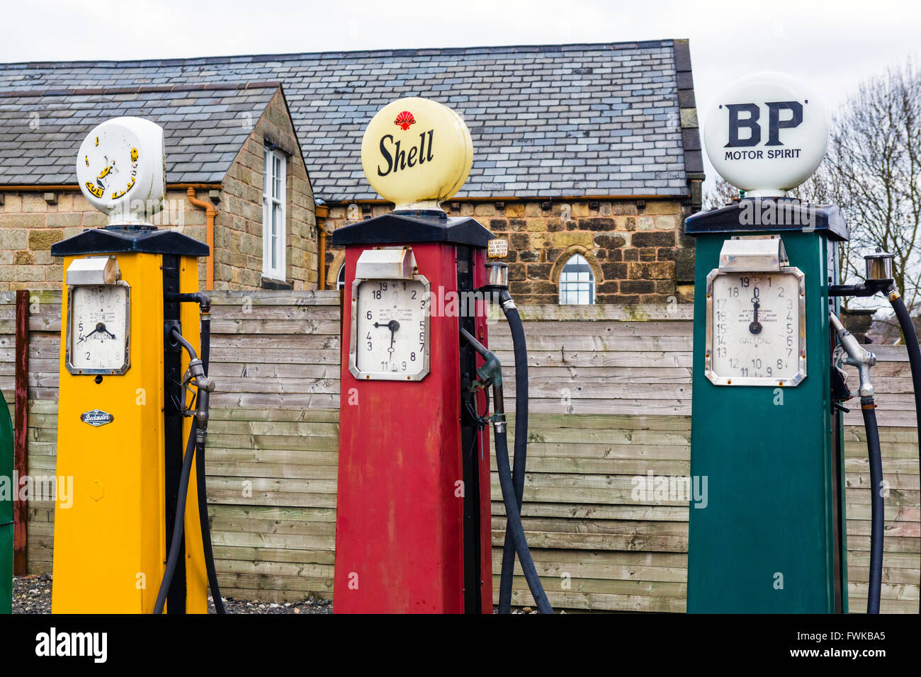 Old fashioned petrol pumps at a garage in the Black Country Living Museum, Dudley, West Midlands, UK Stock Photo