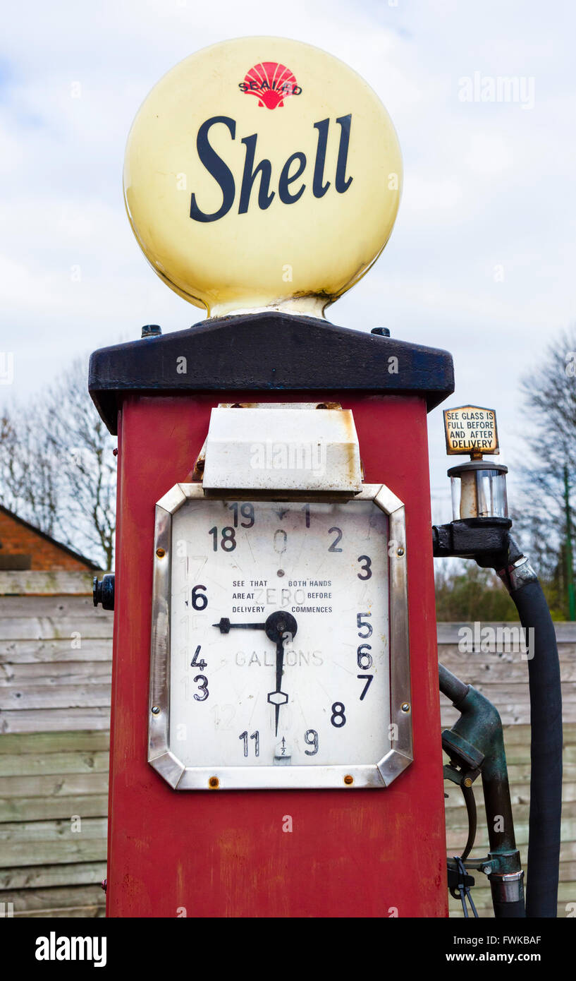 Old fashioned Shell petrol pump at a garage in the Black Country Living Museum, Dudley, West Midlands, UK Stock Photo