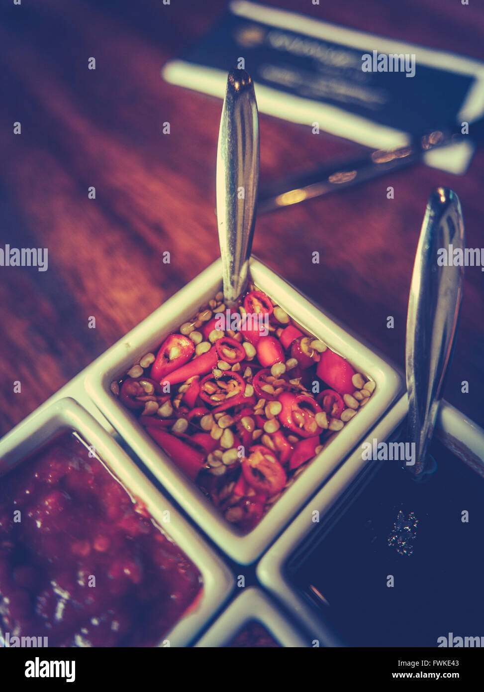 Asian Seasoning And Flavours On A Restaurant Table Stock Photo