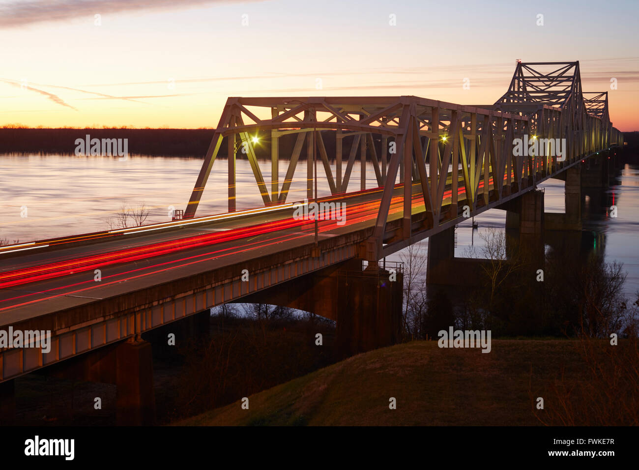 Vicksburg I-20 Bridge over the Mississippi River at twilight. Louisiana is on the other side of the river. Stock Photo
