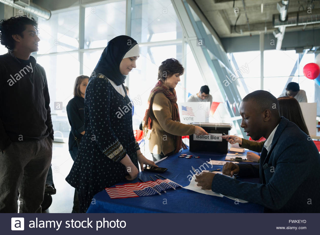 Indian people standing in queue hi-res stock photography and images - Alamy