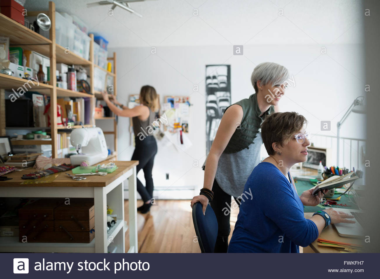 Craftswomen working in home office Stock Photo