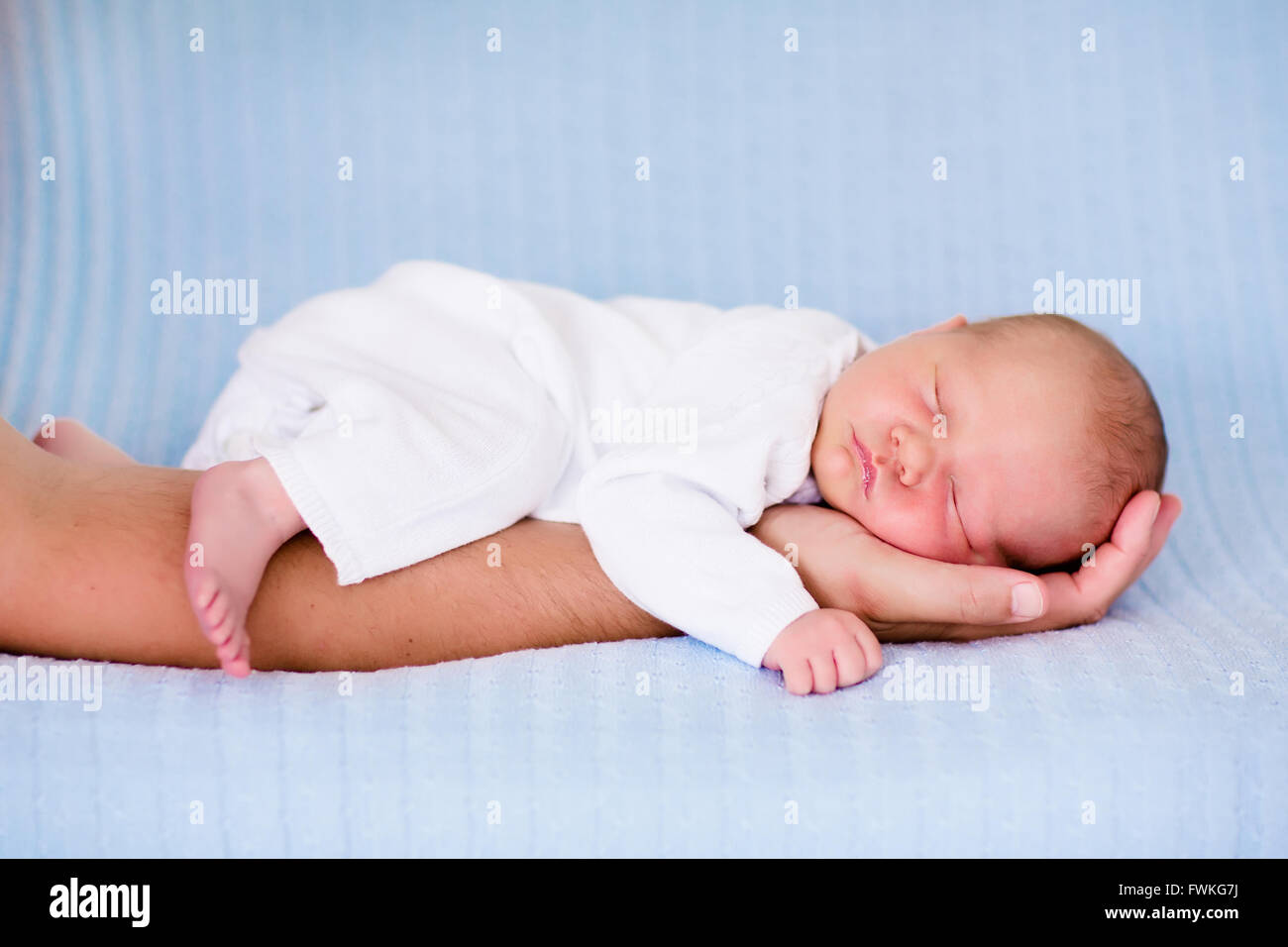 Babies Sleeping In Parents Arms