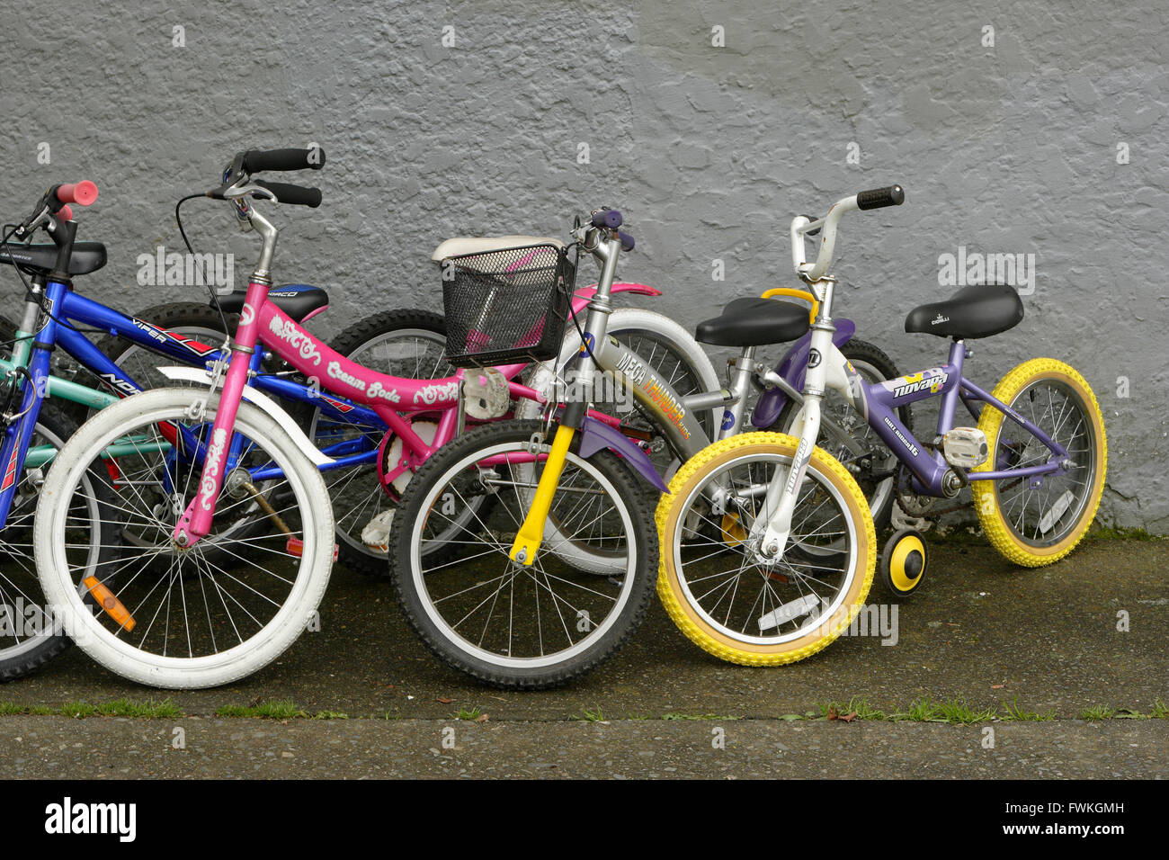 Row of Children's bicycles outside of bicycle shop-Victoria, British Columbia, Canada. Stock Photo