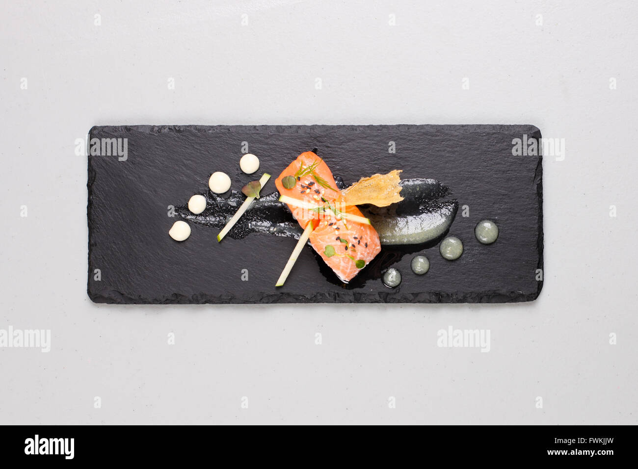 Smoked salmon and sauce cooked by molecular gastronomy technic Stock Photo