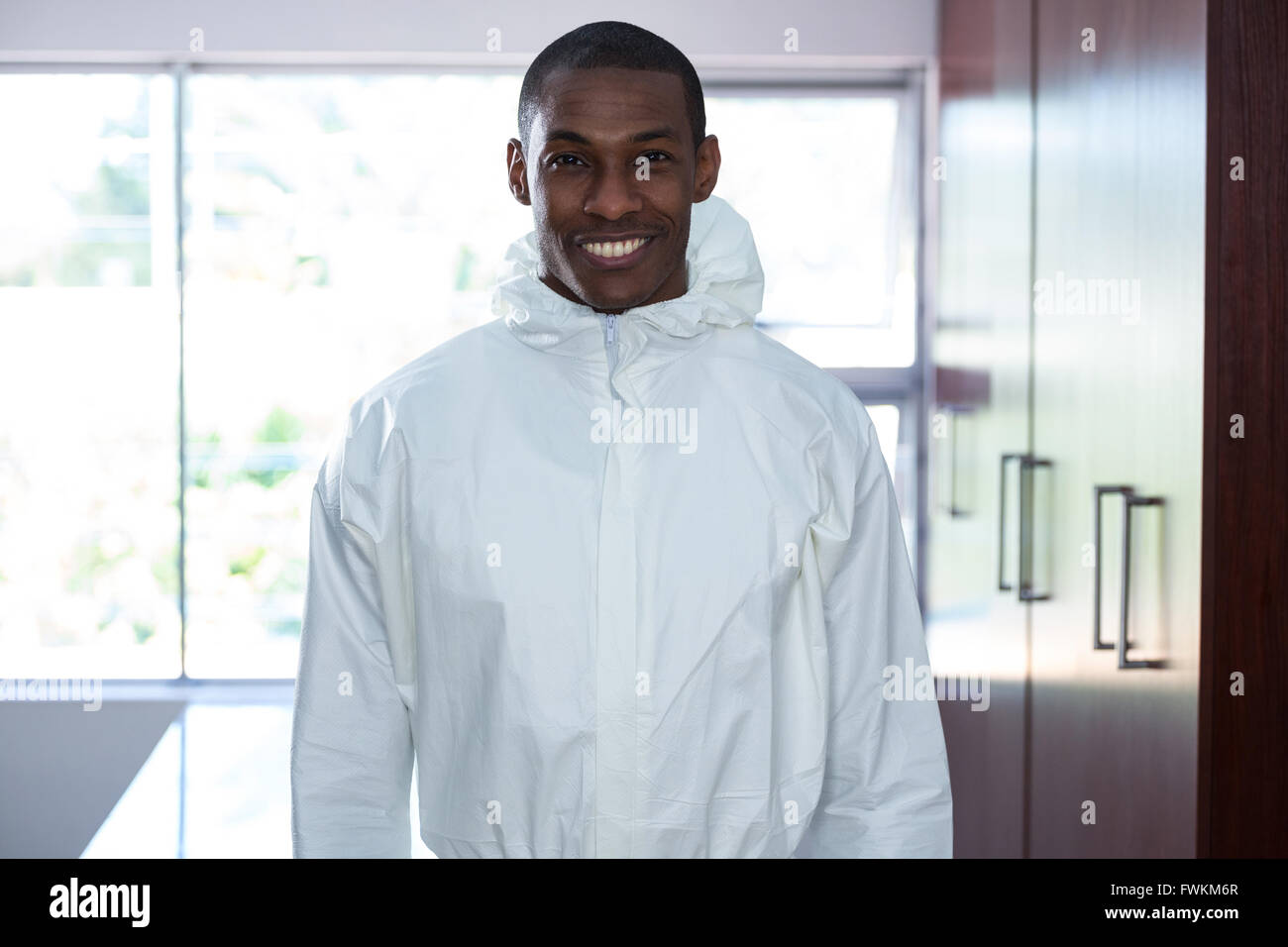 Portrait of smiling pest control man Stock Photo - Alamy
