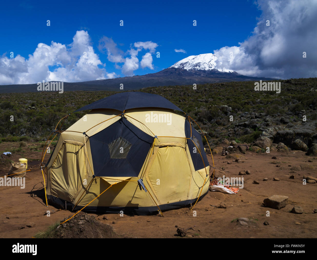 Geodesic tent with view to mountain summit at Shira One Camp on the Lemosho route to Mt Kilimanjaro, Tanzania, Africa Stock Photo