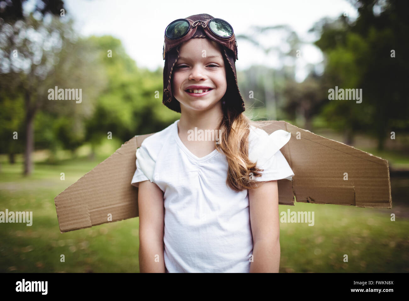 Portrait of happy girl smiling Stock Photo - Alamy
