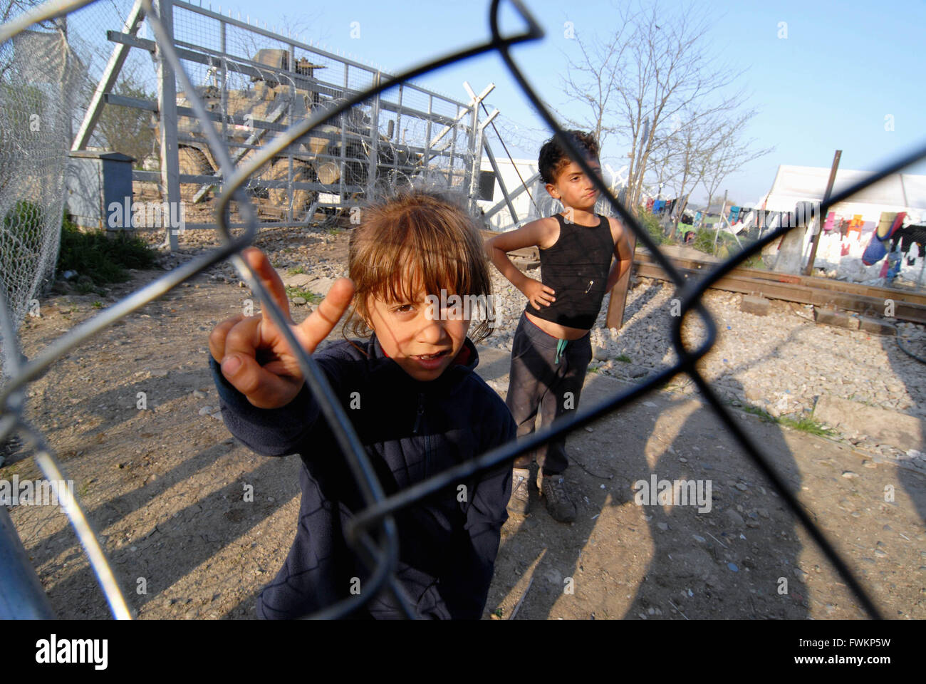 Europe,Greece/Macedonia, border Idomeni/Gevgelija, April 04,2016 :Children living along the railway lines in Idomeni refugge cam Stock Photo