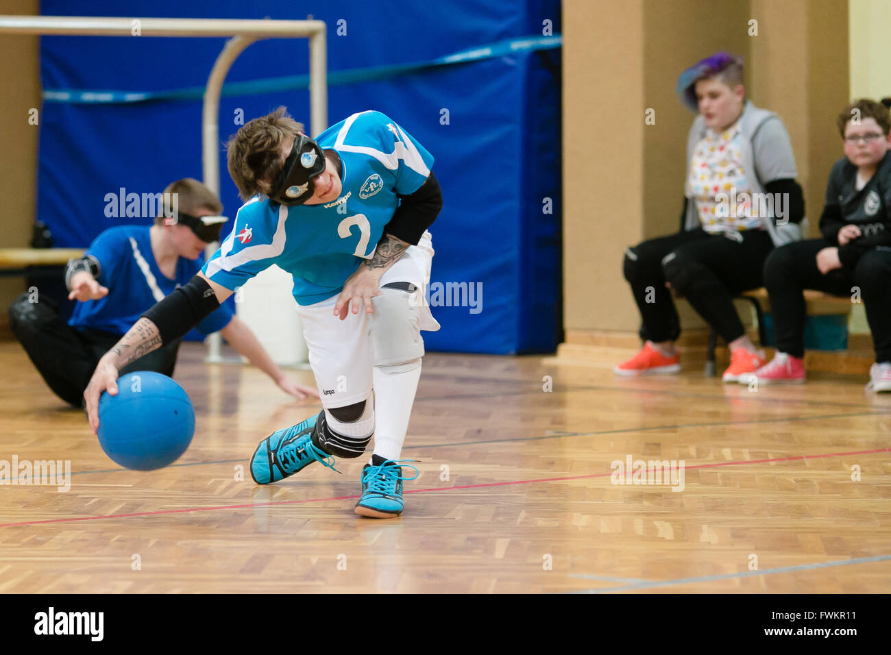 Visually impaired boy is playing Goalball Stock Photo