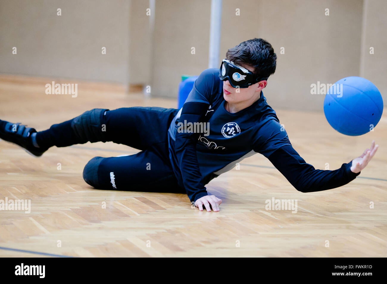 Visually impaired boy is playing Goalball Stock Photo