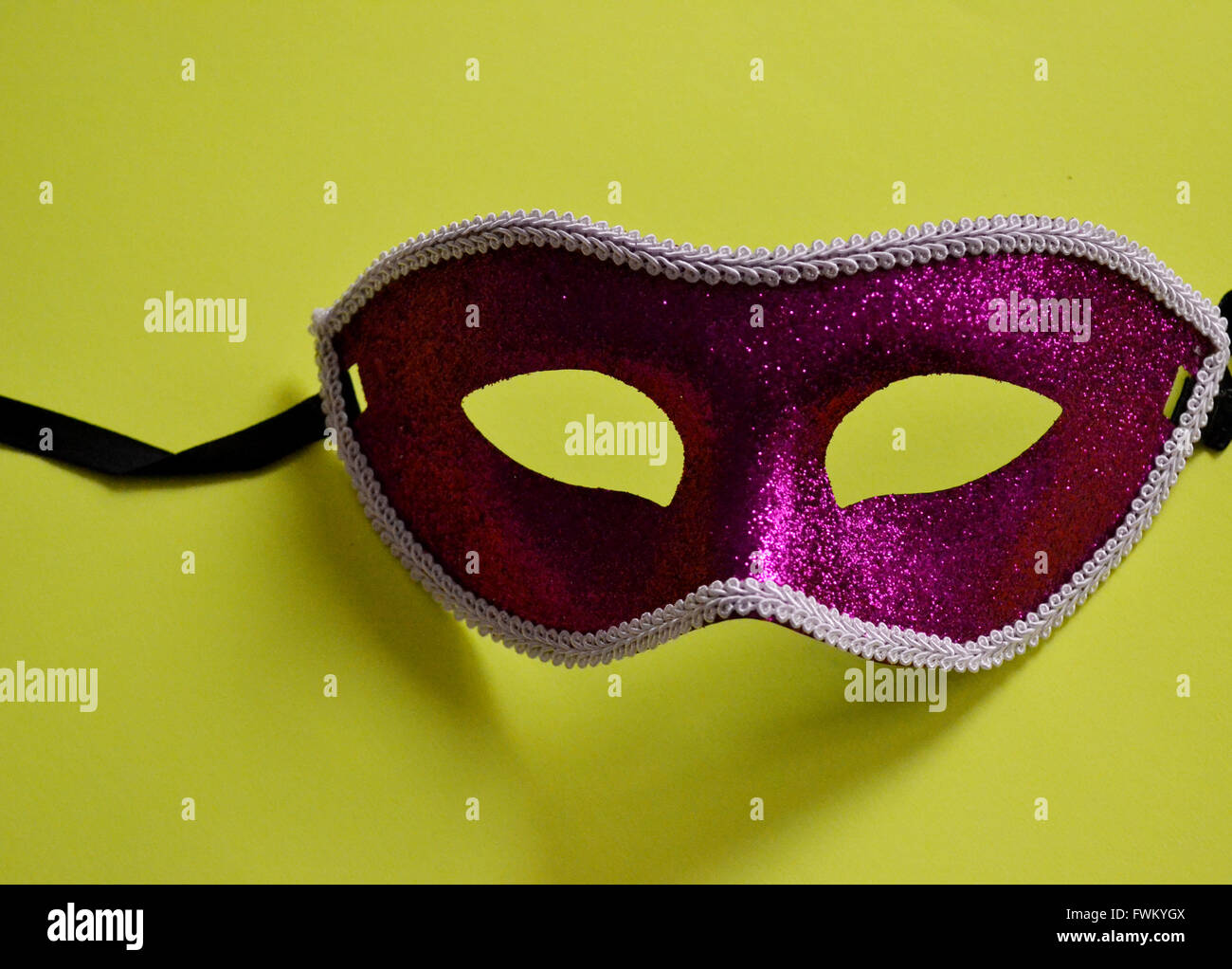 Download Close Up Of Pink Mask On Yellow Background Stock Photo Alamy PSD Mockup Templates