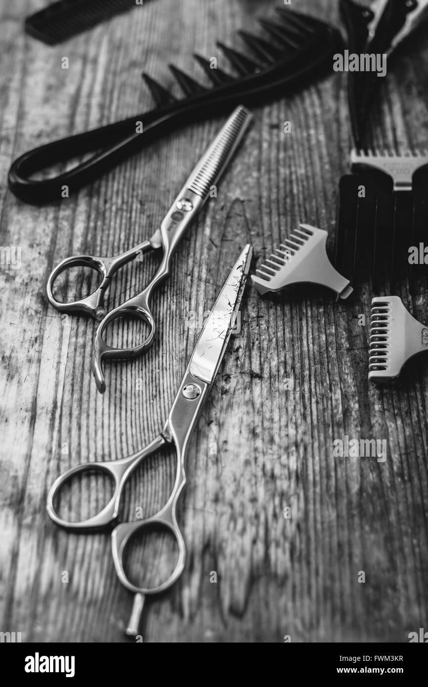 High Angle View Of Scissors And Comb On Table At Barber Shop Stock Photo -  Alamy