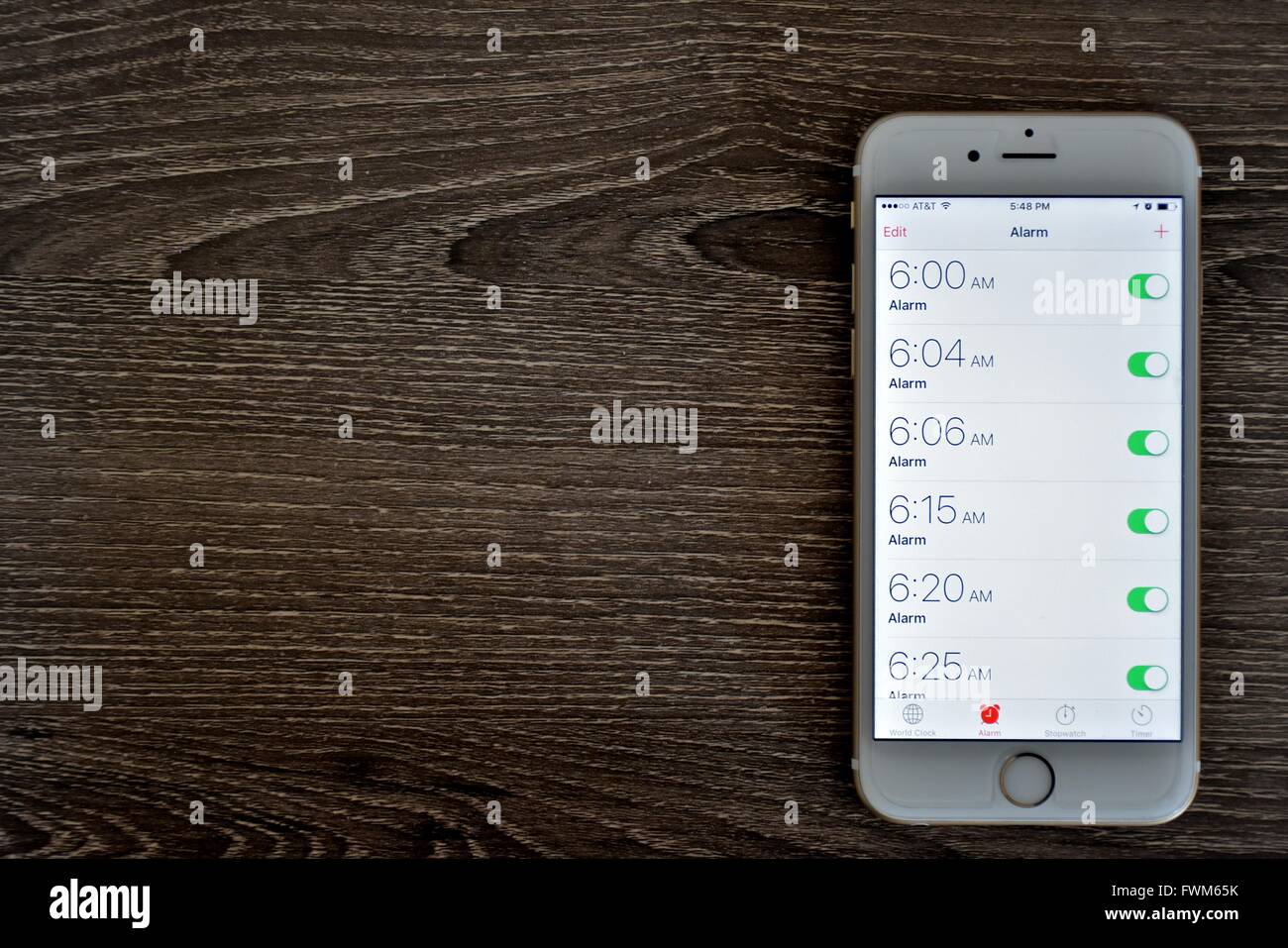 An Apple Iphone 6s Displaying The Alarm Clock Application With Stock Photo Alamy