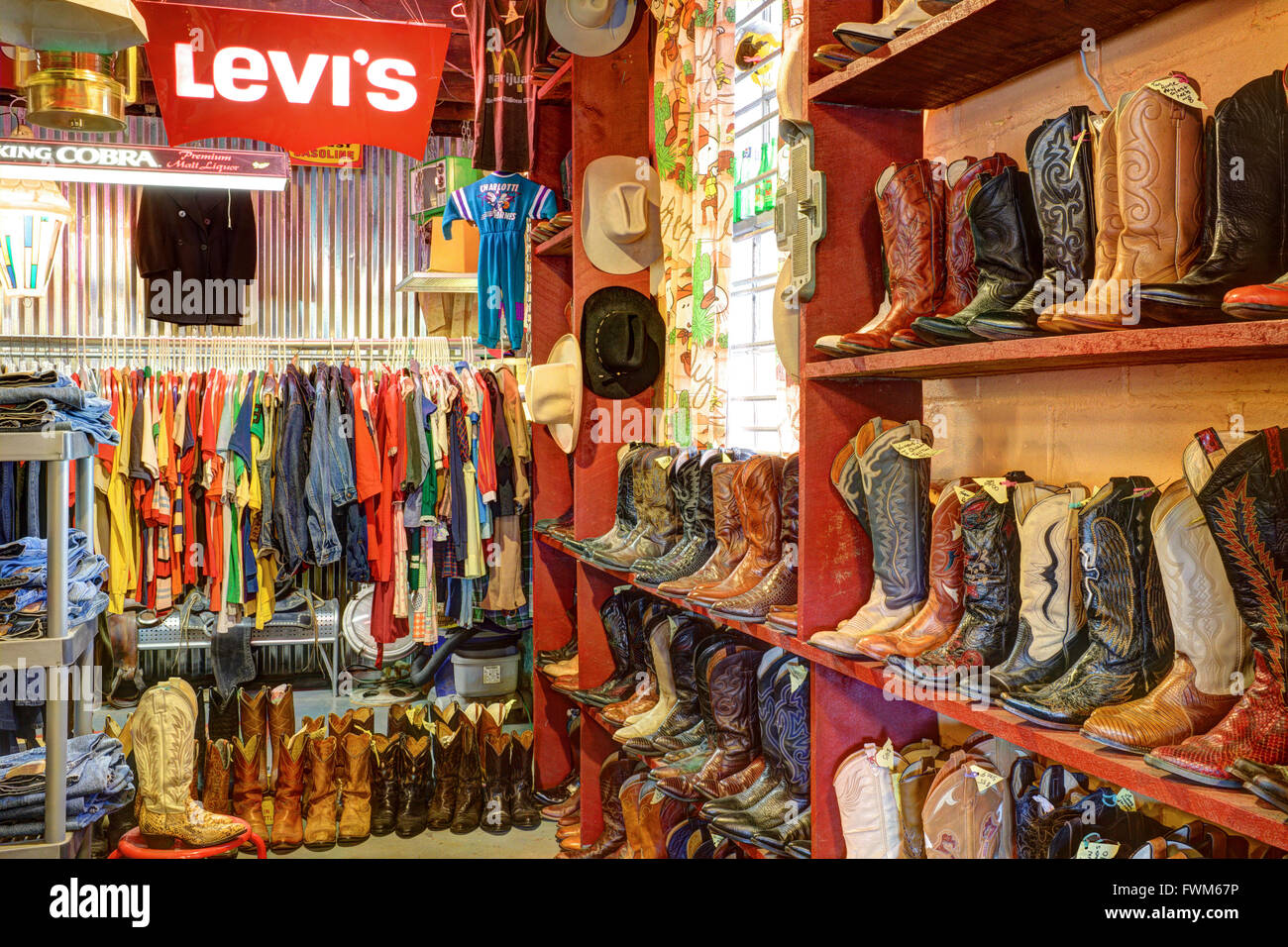 Cowboy boots for sale at the Rat's Nest, a vintage clothing shop in NoDa district, Charlotte, North Carolina, USA Stock Photo