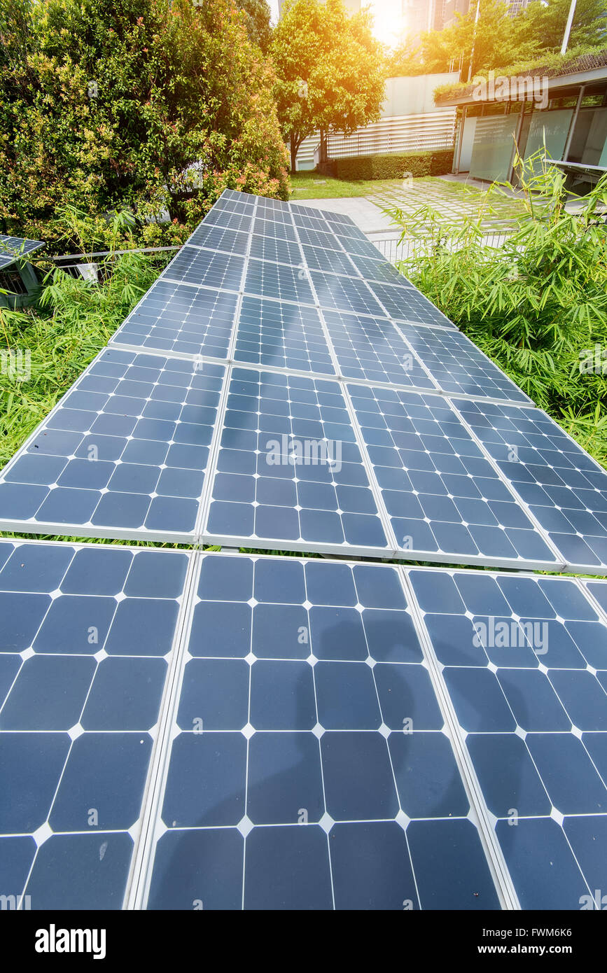 Solar Panels In The Park Of Modern City Stock Photo