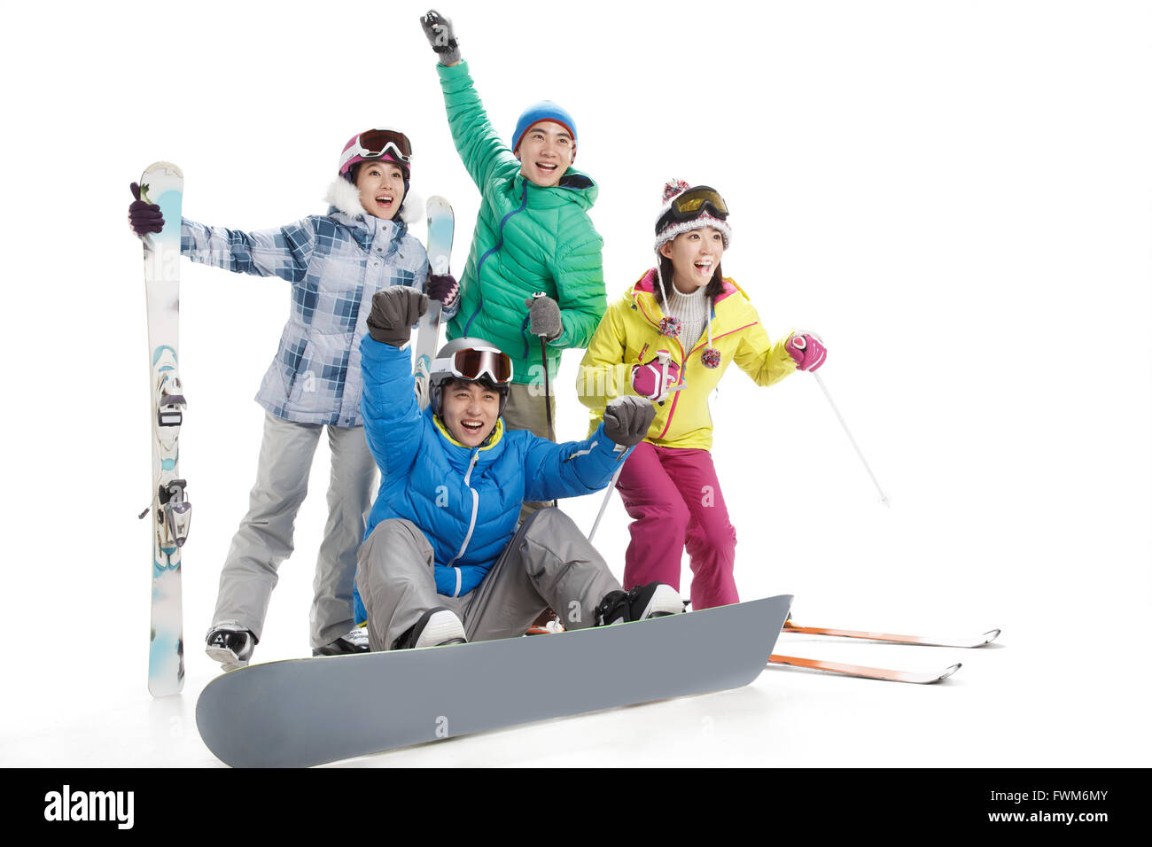 Young men and women ski Stock Photo