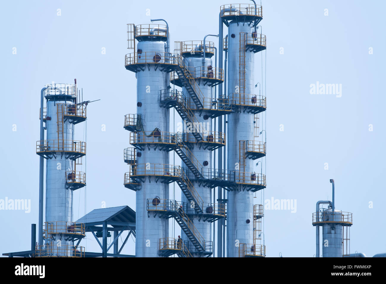 Industrial landscape with chimneys tank Stock Photo