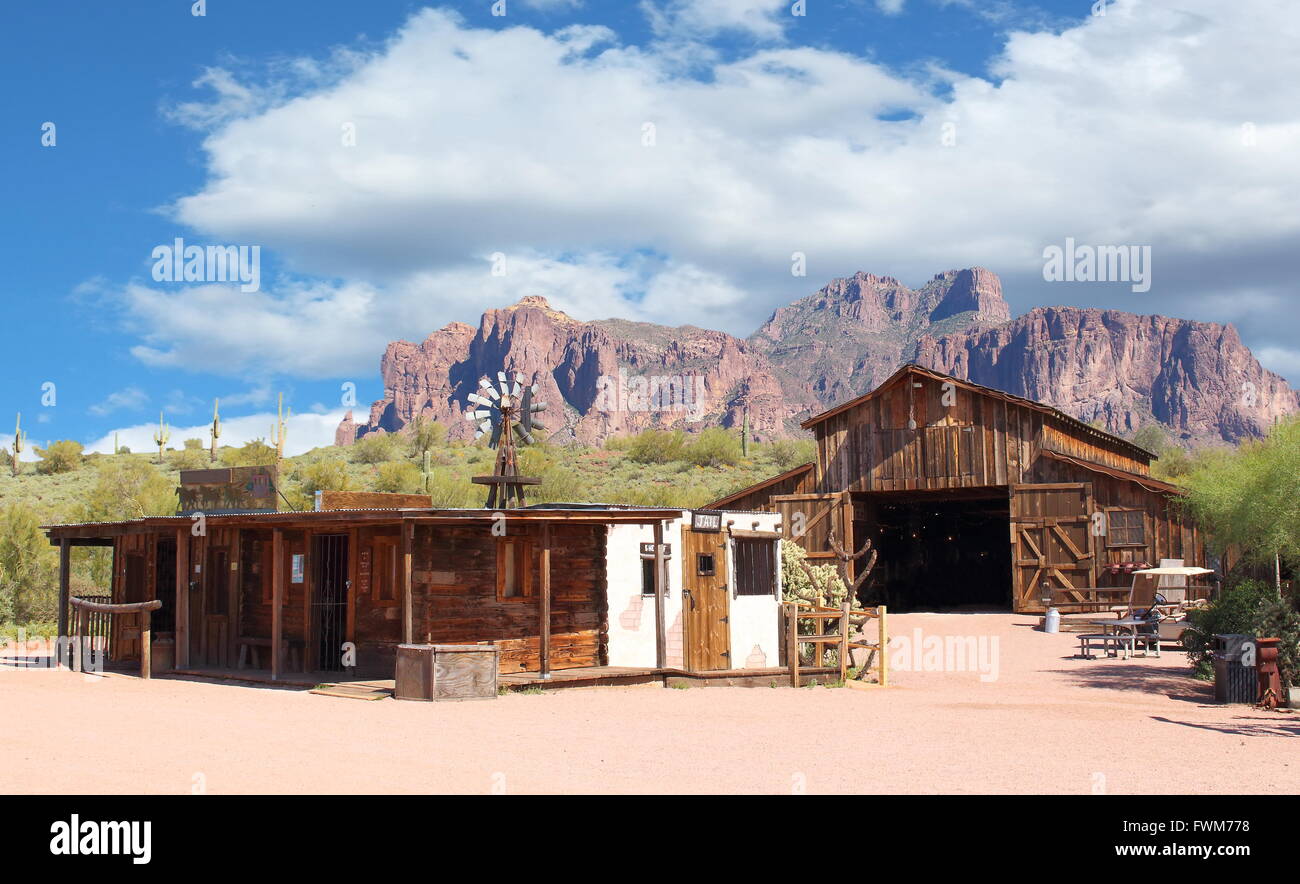 Abandoned old Wild West Cowboy Town used during the gold rush with mountains in background Stock Photo